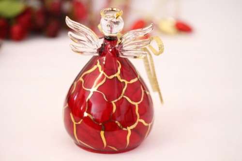 **RS17** A made hand-blown Italian red-glass angel finished with gold detailing by Flamigni