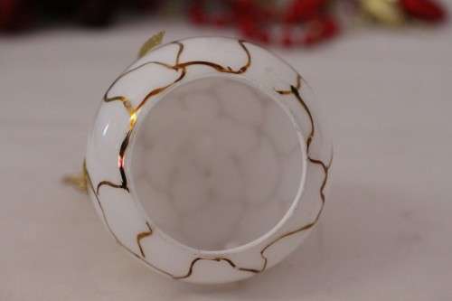 A gorgeous Italian made hand-blown white-glass angel finished with gold detailing by Flamigni