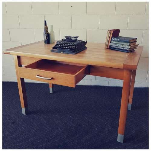 A magnificent "Marks and Spencer" modern Oak desk with metal feet caps and an uncomplicated design!!