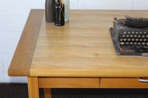 A magnificent "Marks and Spencer" modern Oak desk with metal feet caps and an uncomplicated design!!