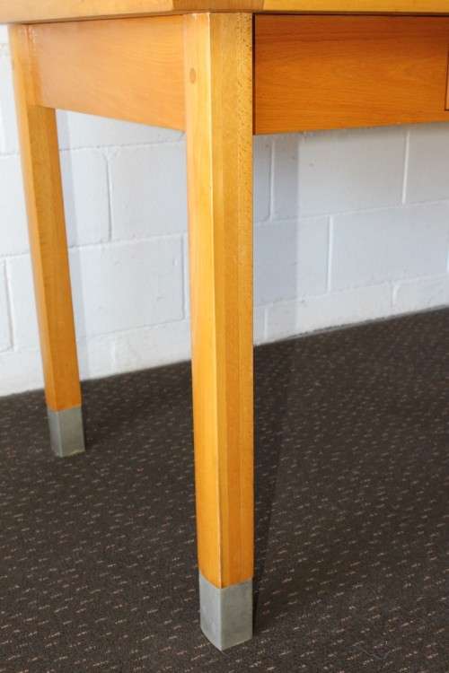A magnificent "Marks and Spencer" modern Oak desk with metal feet caps and an uncomplicated design!!