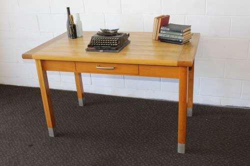 A magnificent "Marks and Spencer" modern Oak desk with metal feet caps and an uncomplicated design!!