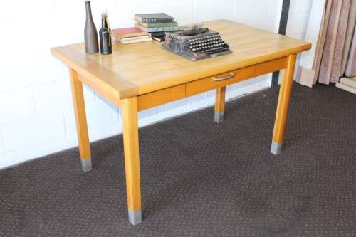 A magnificent "Marks and Spencer" modern Oak desk with metal feet caps and an uncomplicated design!!