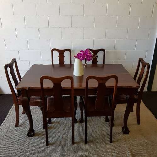 A superb vintage solid Imbuia ball and claw 6 to 8 seater dining suite with six Boston-back chairs
