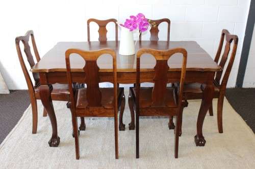 A superb vintage solid Imbuia ball and claw 6 to 8 seater dining suite with six Boston-back chairs