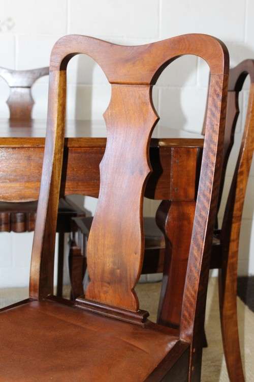 A superb vintage solid Imbuia ball and claw 6 to 8 seater dining suite with six Boston-back chairs