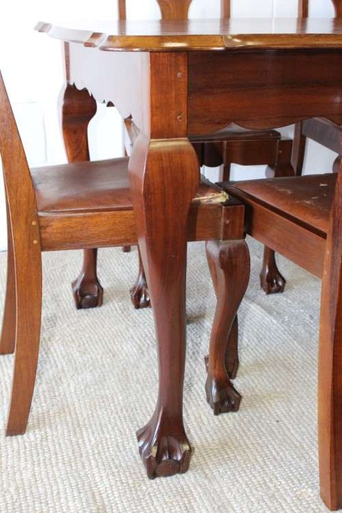 A superb vintage solid Imbuia ball and claw 6 to 8 seater dining suite with six Boston-back chairs