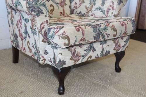 **RS17_Clearance** A beautiful floral upholstered Queen Anne style wing-back lounge suite