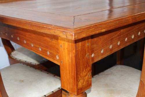 A magnificent Balinese Teak 8-seater dining suite with stylish upholstered curved-back chairs