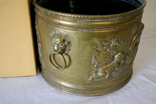 A lovely antique open bottomed solid brass pot plant with punched detailing.