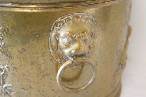 A lovely antique open bottomed solid brass pot plant with punched detailing.