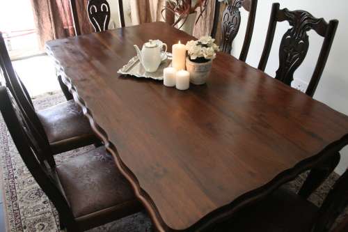 A stunning vintage Ball & Claw dining room suite with 6 fabulous carved chairs