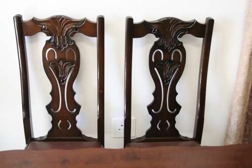 A stunning vintage Ball & Claw dining room suite with 6 fabulous carved chairs