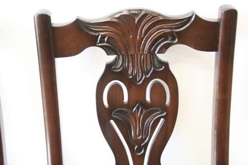 A stunning vintage Ball & Claw dining room suite with 6 fabulous carved chairs