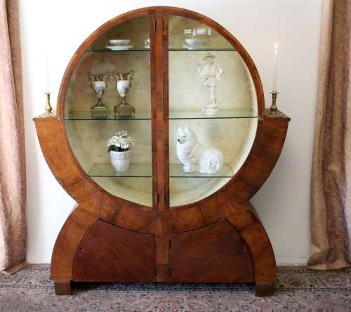 An elegant ART DECO (1930's) circular display cabinet with 3 shelves and bottom cupboards
