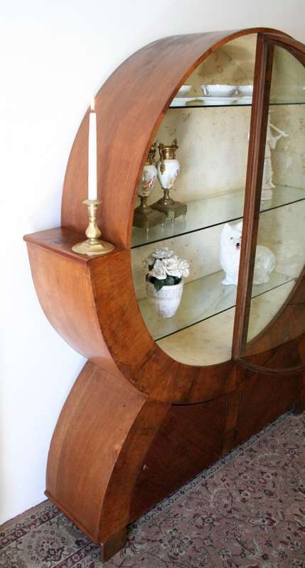 An elegant ART DECO (1930's) circular display cabinet with 3 shelves and bottom cupboards