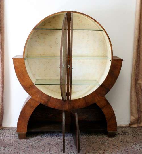 An elegant ART DECO (1930's) circular display cabinet with 3 shelves and bottom cupboards