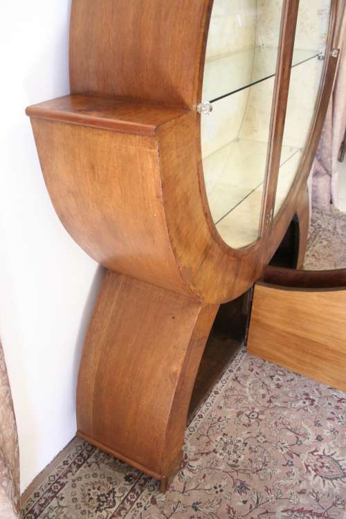 An elegant ART DECO (1930's) circular display cabinet with 3 shelves and bottom cupboards