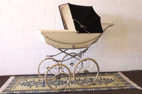 A rare vintage British made Marmet "coach-built" pram with drop-down canopy, foot brake & more