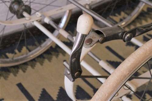 A rare vintage British made Marmet "coach-built" pram with drop-down canopy, foot brake & more