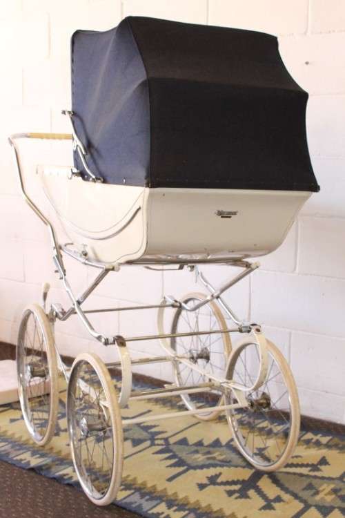 A rare vintage British made Marmet "coach-built" pram with drop-down canopy, foot brake & more