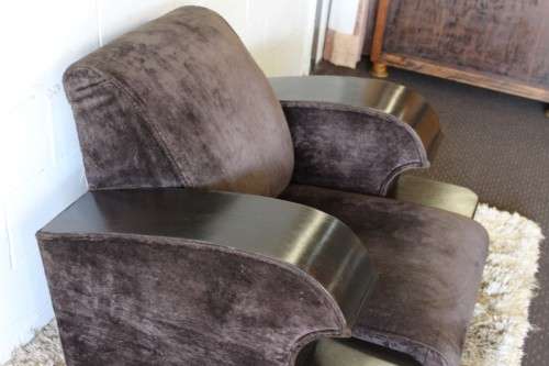An incredible and rare Art Deco "club" armchair with drinks-rest in a rich chocolate brown fabric