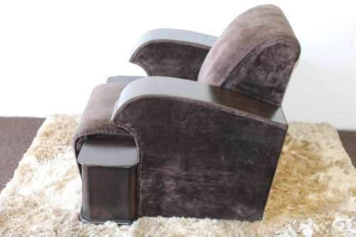 An incredible and rare Art Deco "club" armchair with drinks-rest in a rich chocolate brown fabric