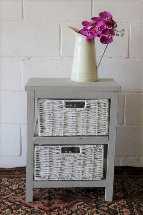 An awesome grey wooden 2-drawer pedestal with white wicker drawers - great in the bathroom