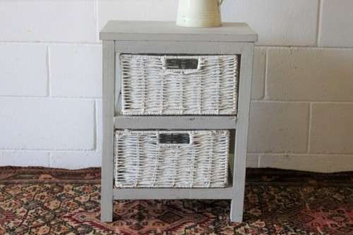 An awesome grey wooden 2-drawer pedestal with white wicker drawers - great in the bathroom