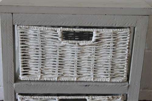 An awesome grey wooden 2-drawer pedestal with white wicker drawers - great in the bathroom