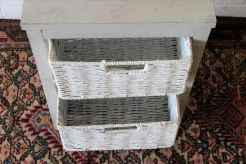An awesome grey wooden 2-drawer pedestal with white wicker drawers - great in the bathroom