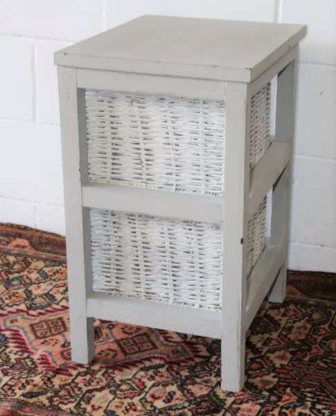 An awesome grey wooden 2-drawer pedestal with white wicker drawers - great in the bathroom