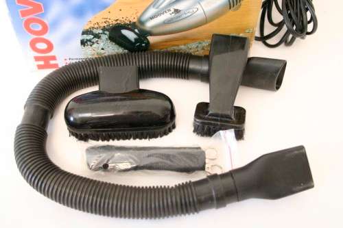 **RS17** A useful 600W Hoover "Sharky" hand-held electric corded vacuum cleaner with attachments