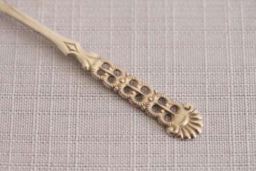 A wonderful antique European Art Deco 830S solid silver 2-prong shellfish fork with ornate detailing