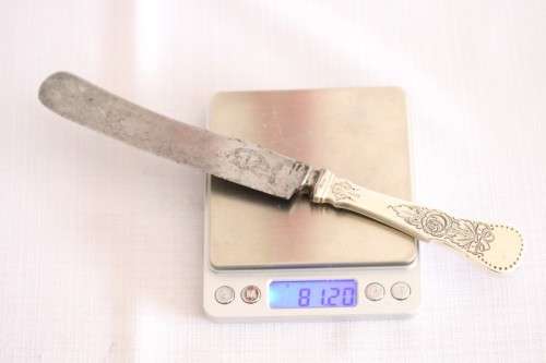 An incredible antique (c1910) Swedish made 830S solid silver knife with ornate detailing