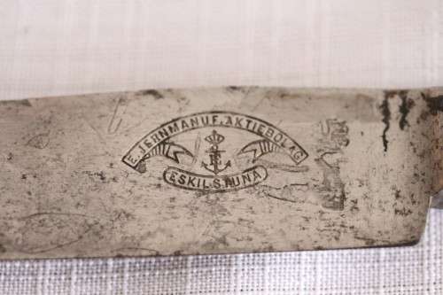 An incredible antique (c1910) Swedish made 830S solid silver knife with ornate detailing