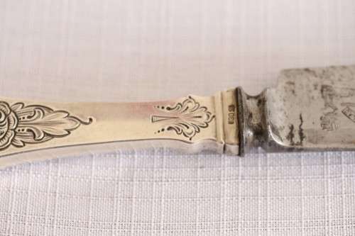 An incredible antique (c1910) Swedish made 830S solid silver knife with ornate detailing