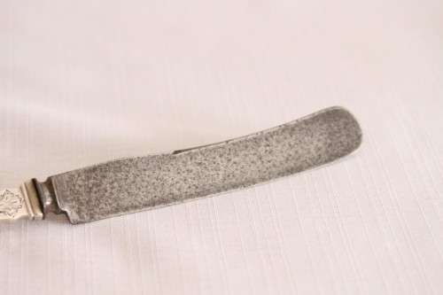 An incredible antique (c1910) Swedish made 830S solid silver knife with ornate detailing