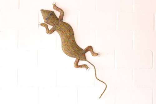A stunning large (101cm long) hand made glass beaded lizard/ gecko decorative wall ornament