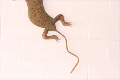 A stunning large (101cm long) hand made glass beaded lizard/ gecko decorative wall ornament
