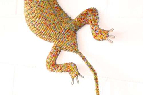 A stunning large (101cm long) hand made glass beaded lizard/ gecko decorative wall ornament