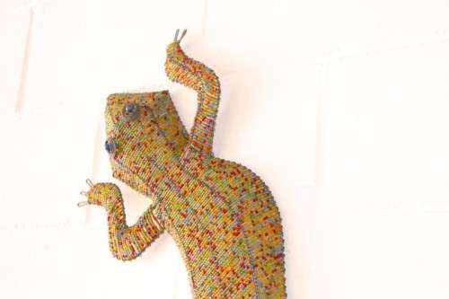 A stunning large (101cm long) hand made glass beaded lizard/ gecko decorative wall ornament
