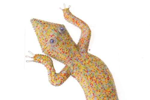 A stunning large (101cm long) hand made glass beaded lizard/ gecko decorative wall ornament