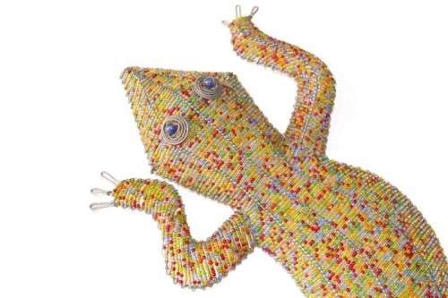 A stunning large (101cm long) hand made glass beaded lizard/ gecko decorative wall ornament