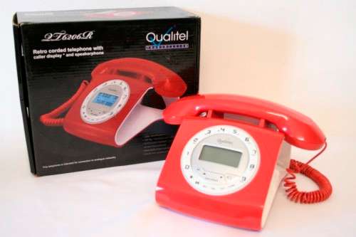 An awesome Qualitel Retro corded telephone with caller ID and speaker phone in its box.