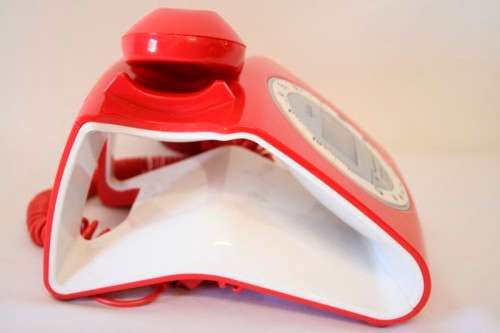 An awesome Qualitel Retro corded telephone with caller ID and speaker phone in its box.