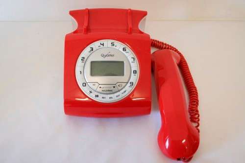 An awesome Qualitel Retro corded telephone with caller ID and speaker phone in its box.