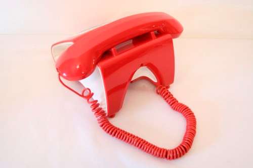 An awesome Qualitel Retro corded telephone with caller ID and speaker phone in its box.