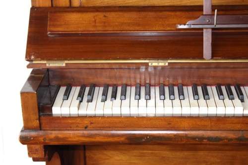 A spectacular antique Edwardian "John Brinsmead & Sons" upright piano - elegant addition to a lounge