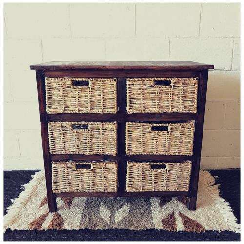 An awesome dark wooden 6-drawer cabinet with wicker drawers - great in the bathroom or bedroom!